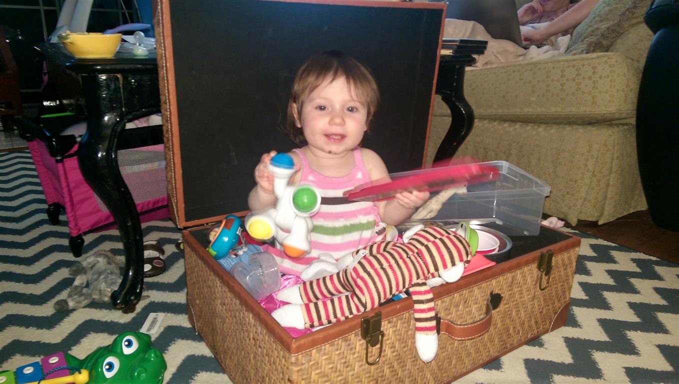 Maggie in a toybox